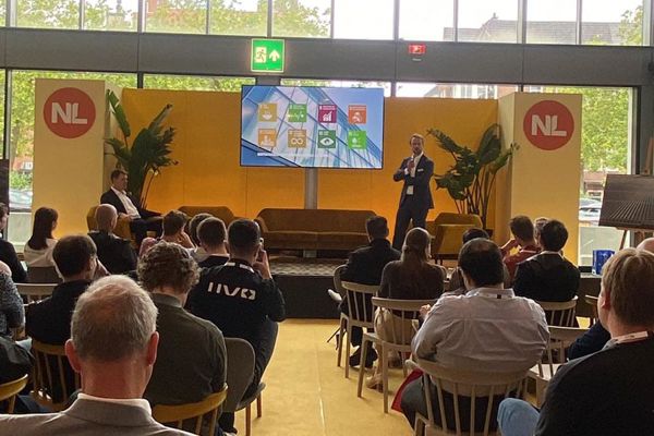 Audience listening to a presentation by KUBO at the Rai in Amsterdam